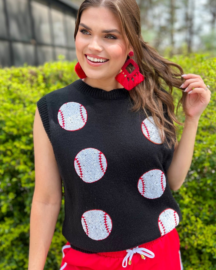 a black sleeveless sweater vest with an oversized fit, an allover textured baseball motif, and ribbed trim at the neckline, arm openings, and hem