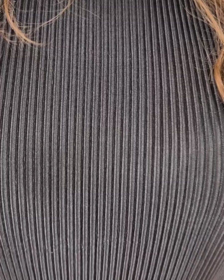 black pleated two-piece elastic button keyhole back top and elastic waistband bottoms with flowy legs and pockets