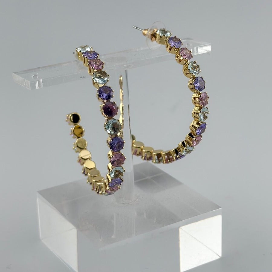 gold post-stud hoops adorned with colorful gems and a comfort earring back in gold