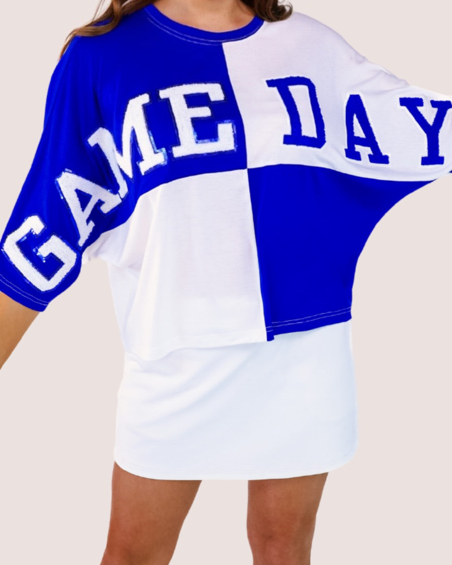 short-sleeve color block mom crop top with oversized chenille 'GAME DAY' lettering outlined in sequins, where GAME pops with a coordinating color outline to match the color block style, while DAY stands out with a crisp white outline in blue