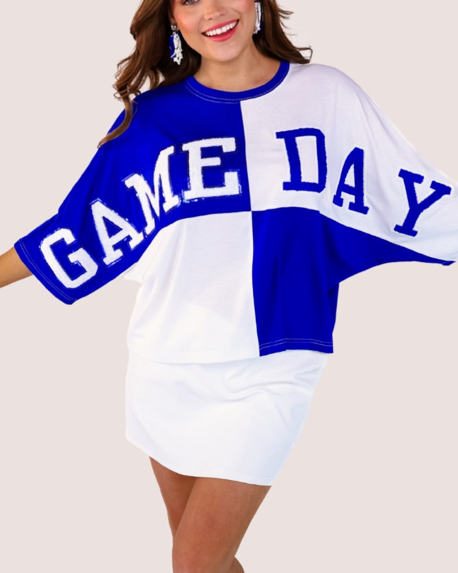 short-sleeve color block mom crop top with oversized chenille 'GAME DAY' lettering outlined in sequins, where GAME pops with a coordinating color outline to match the color block style, while DAY stands out with a crisp white outline in blue