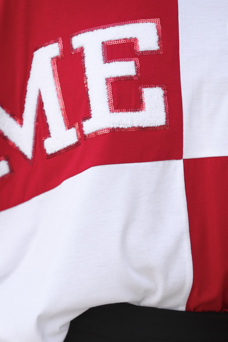 short-sleeve color block mom crop top with oversized chenille 'GAME DAY' lettering outlined in sequins, where GAME pops with a coordinating color outline to match the color block style, while DAY stands out with a crisp white outline in red