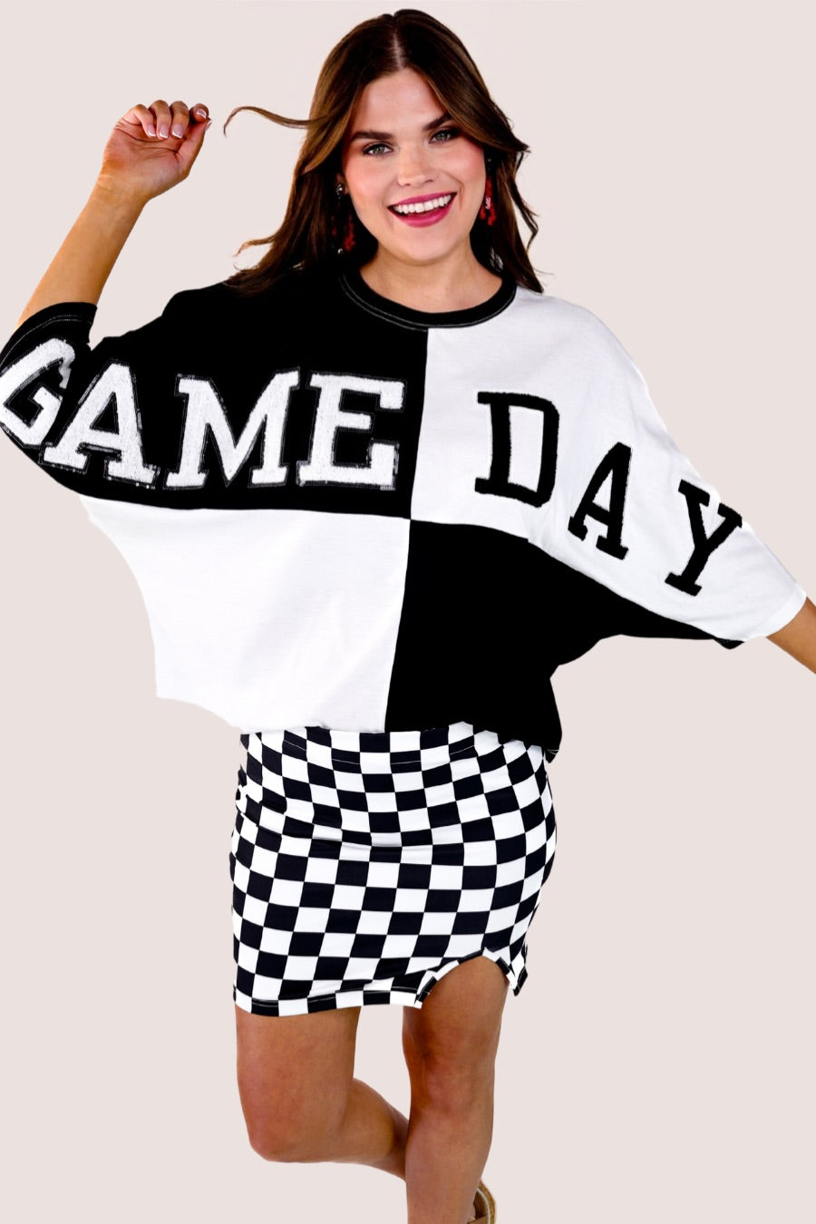 short-sleeve color block mom crop top with oversized chenille 'GAME DAY' lettering outlined in sequins, where GAME pops with a coordinating color outline to match the color block style, while DAY stands out with a crisp white outline in black