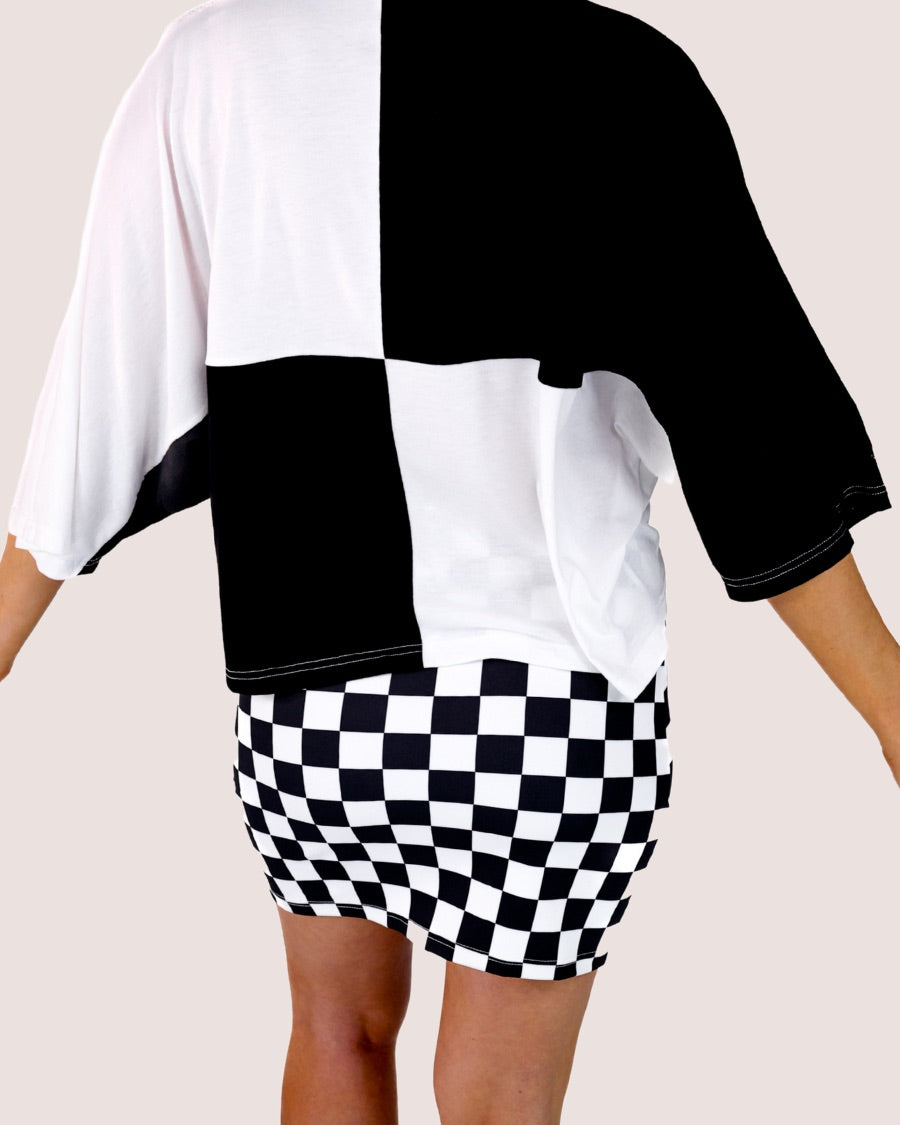 short-sleeve color block mom crop top with oversized chenille 'GAME DAY' lettering outlined in sequins, where GAME pops with a coordinating color outline to match the color block style, while DAY stands out with a crisp white outline in black