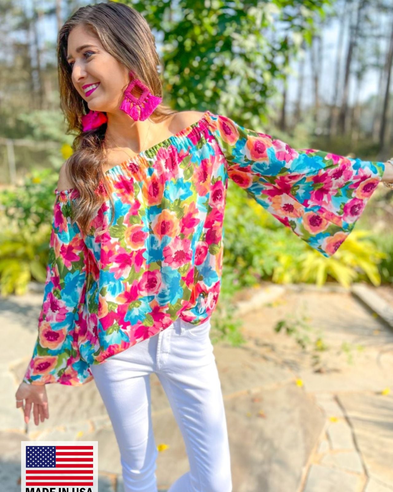 made in USA off-the-shoulder flow top with an elastic neckline in a vibrant exclusive floral pattern in multicolor