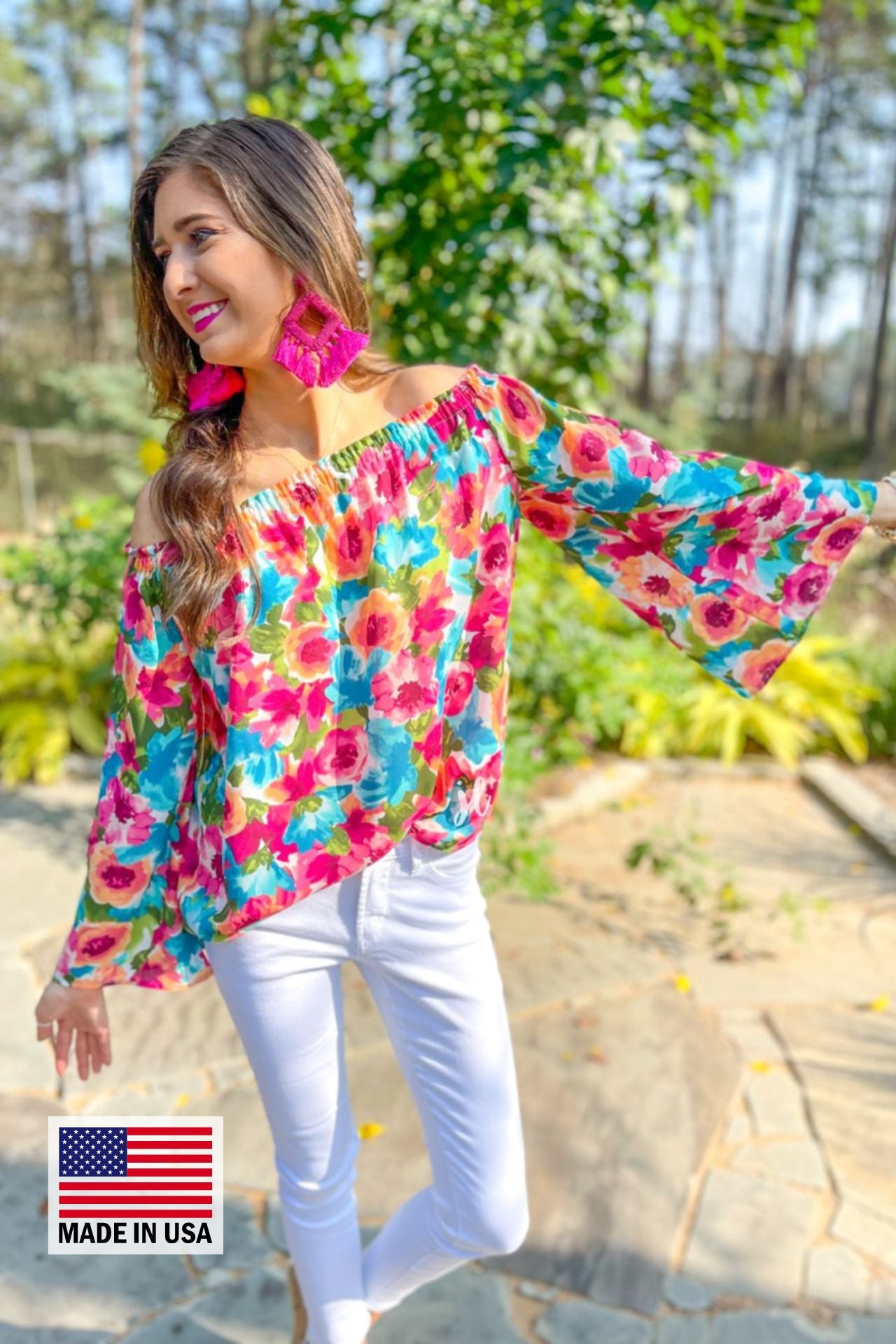 made in USA off-the-shoulder flow top with an elastic neckline in a vibrant exclusive floral pattern in multicolor