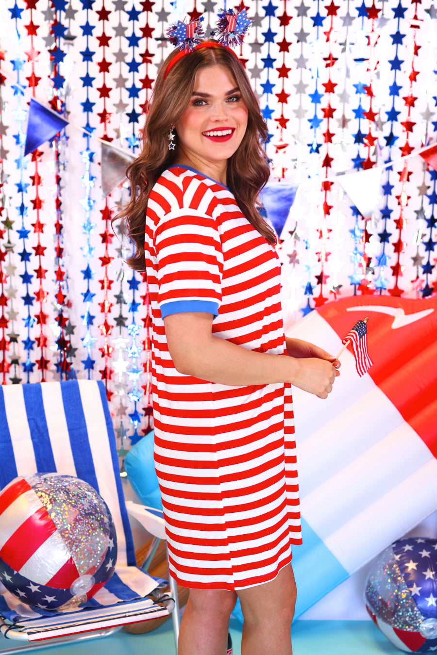short-sleeve dress, crafted from ultra-soft fabric in a solid white color with horizontal red stripes, a blue collar, and cuffed sleeves