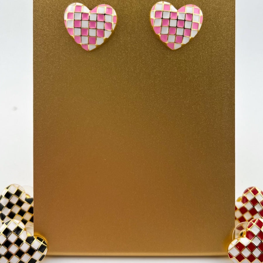vibrant pink heart-shaped stud with a comfort earring back in gold
