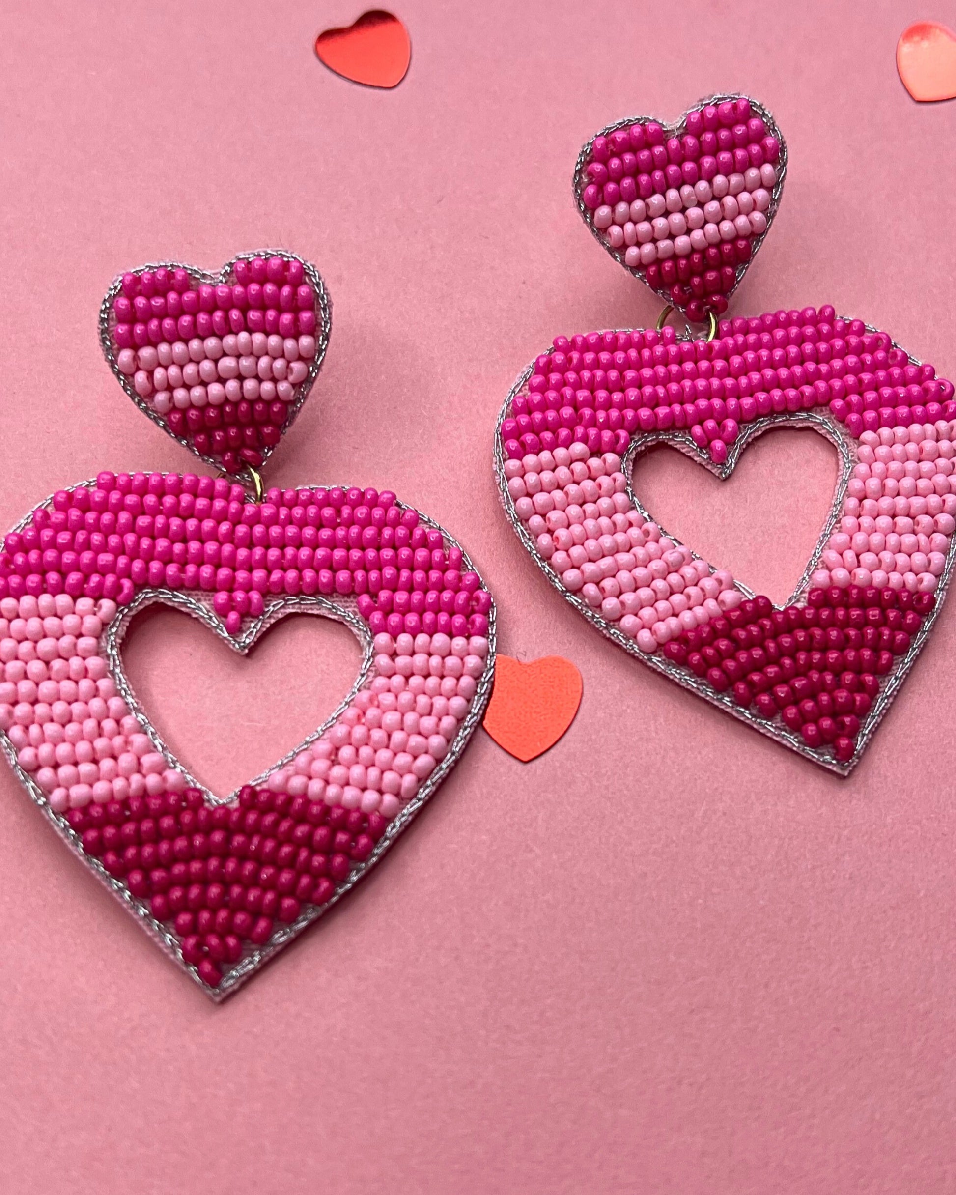 pink ombré horizontal stripe dangle earrings with a comfort back with a plastic disc stopper in gold