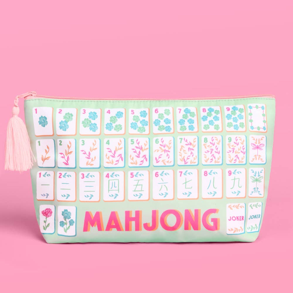 a soft nylon mahjong zipper bag with a pastel tile print, pink tassel pull, smooth top closure, and interior zipper pocket