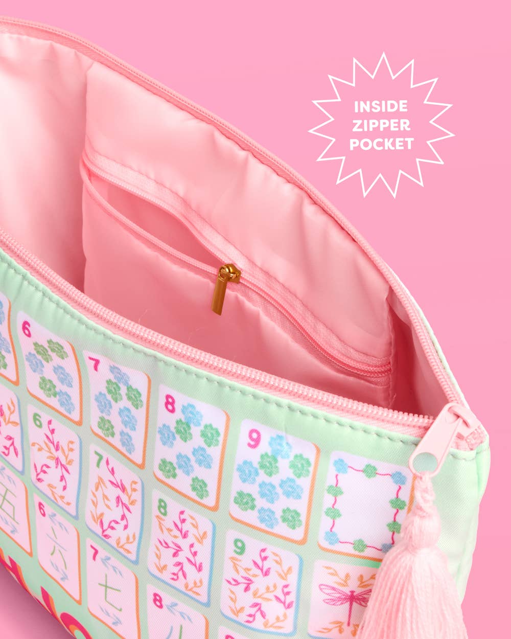 a soft nylon mahjong zipper bag with a pastel tile print, pink tassel pull, smooth top closure, and interior zipper pocket