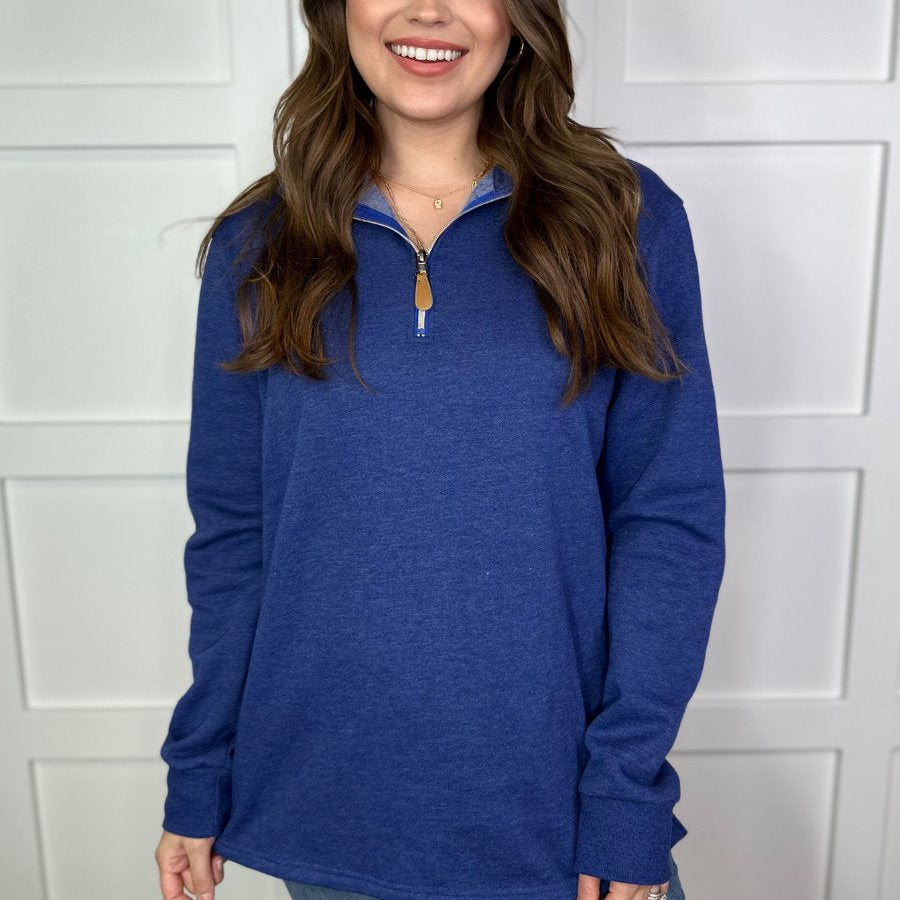 long sleeve pullover crafted from vintage wash fabric with a foldable collar, side slits, and a quarter zip in navy