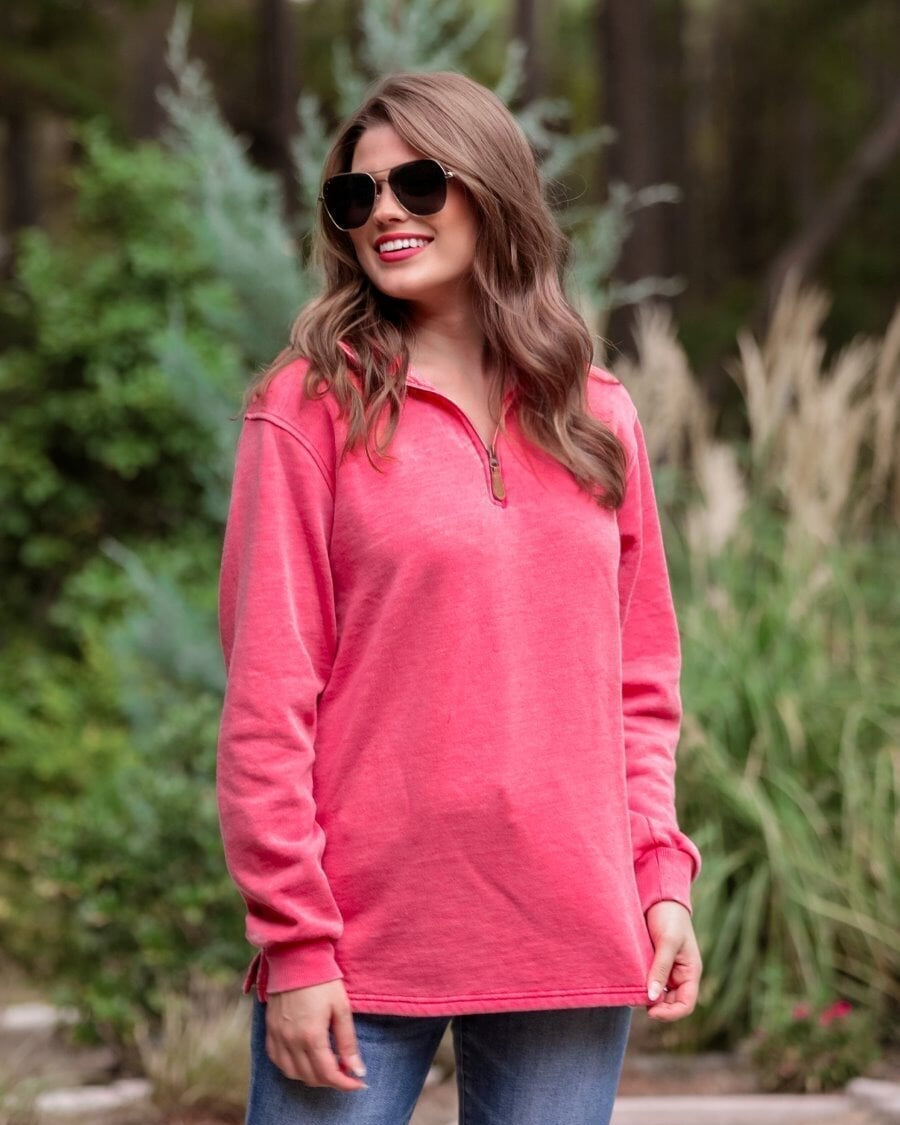 long sleeve pullover crafted from vintage wash fabric with a foldable collar, side slits, and a quarter zip in red