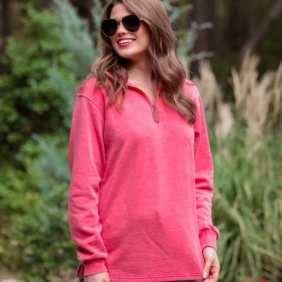 long sleeve pullover crafted from vintage wash fabric with a foldable collar, side slits, and a quarter zip in red