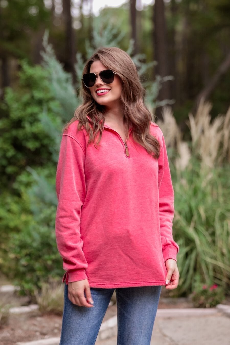 long sleeve pullover crafted from vintage wash fabric with a foldable collar, side slits, and a quarter zip in red