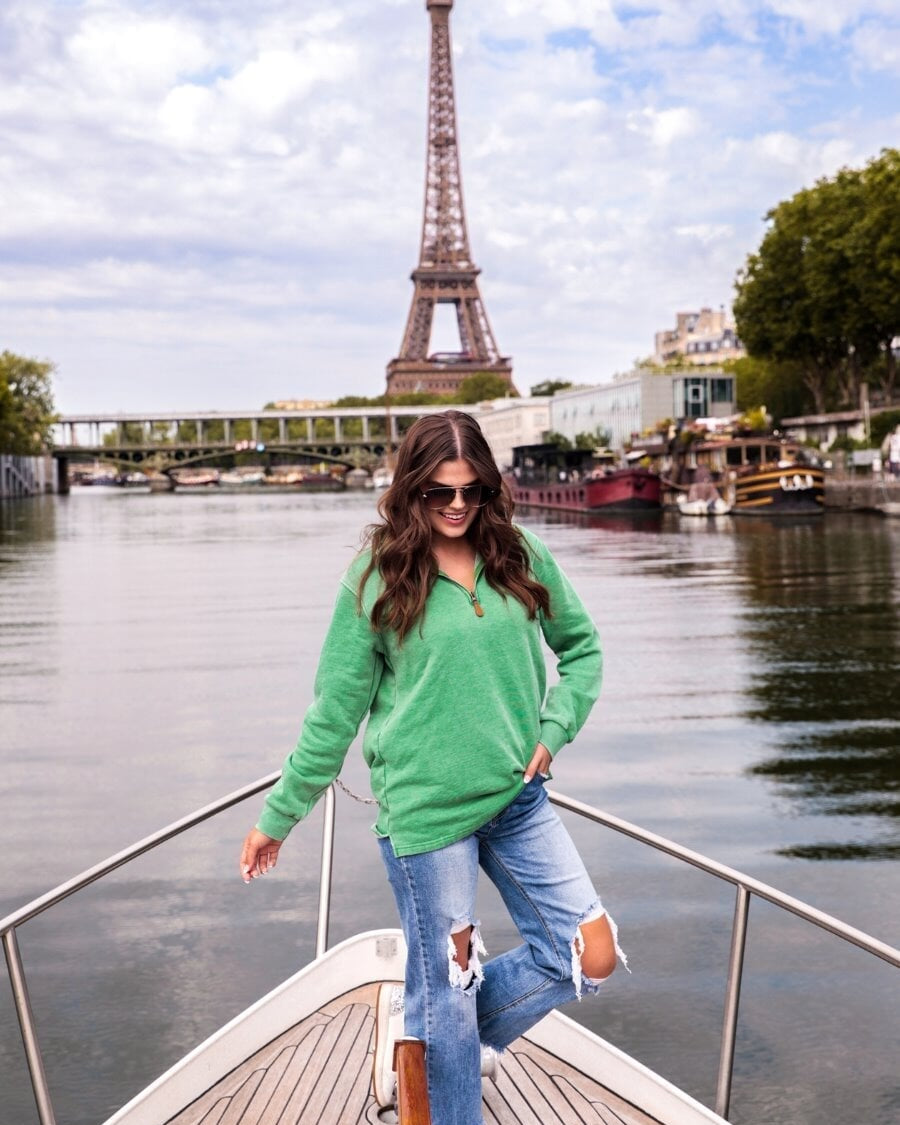 long sleeve pullover crafted from vintage wash fabric with a foldable collar, side slits, and a quarter zip in green