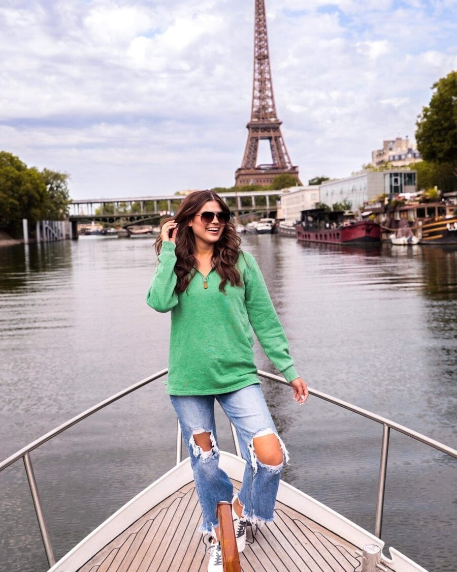 long sleeve pullover crafted from vintage wash fabric with a foldable collar, side slits, and a quarter zip in green