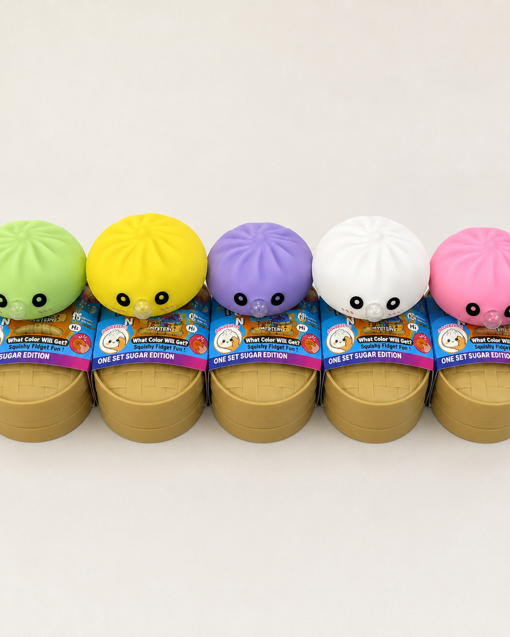 a mystery dumpling-shaped squishy fidget with assorted surprise colors, a soft sensory feel, and a bubble-blowing mouth detail