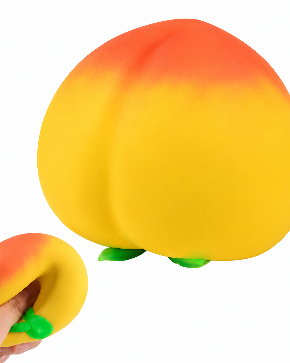 a yellow-orange ombré peach-shaped squishy toy with a soft touch texture, rounded fruit design, center groove, green leaf accent, and clear individual packaging