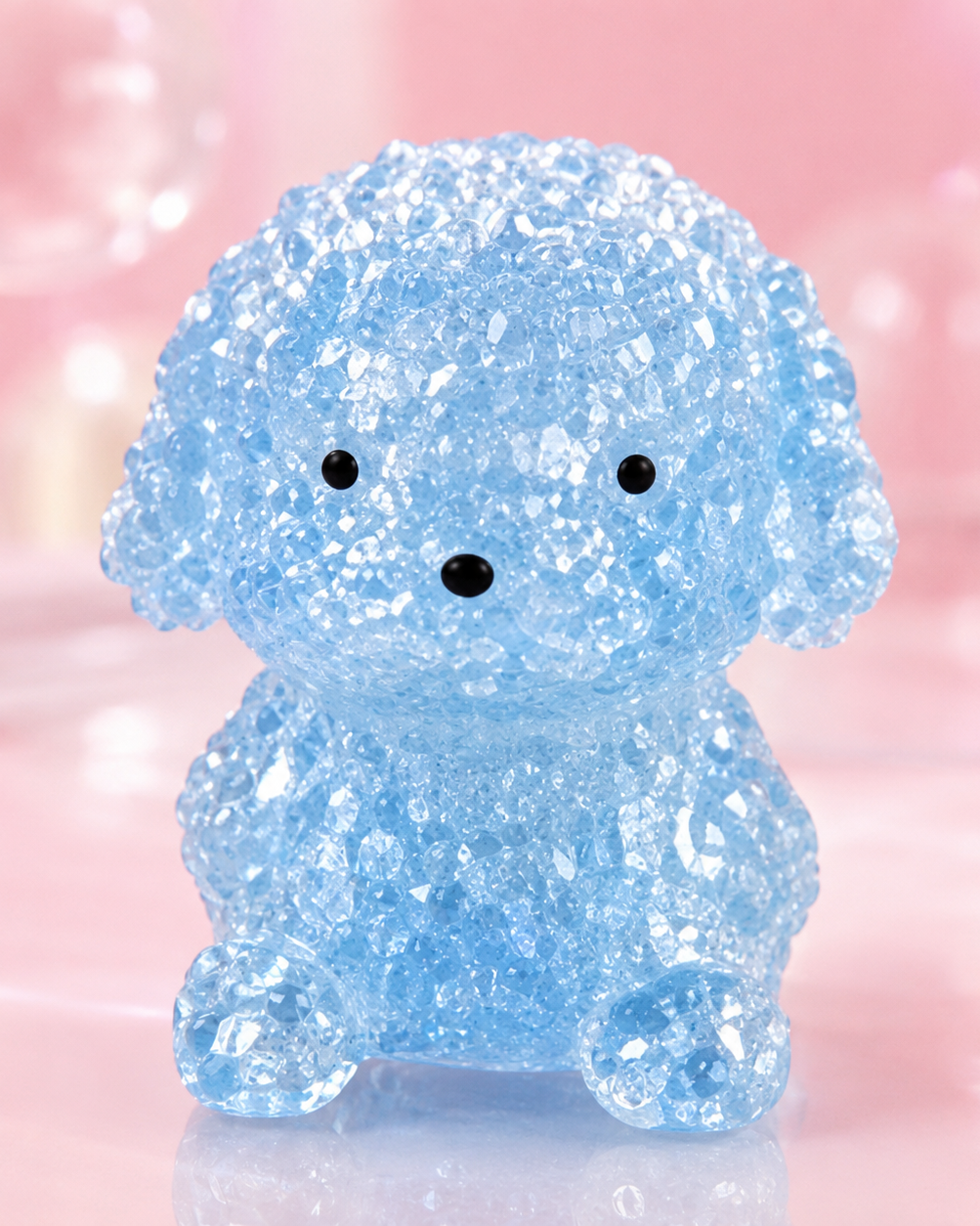 a blue gel-filled puppy-shaped squishy with a translucent crystal-like texture, assorted colors, tiny face details, and a soft handheld design
