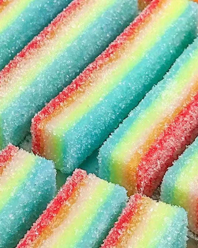 Close-up of colorful striped sour rainbow candy squishies
