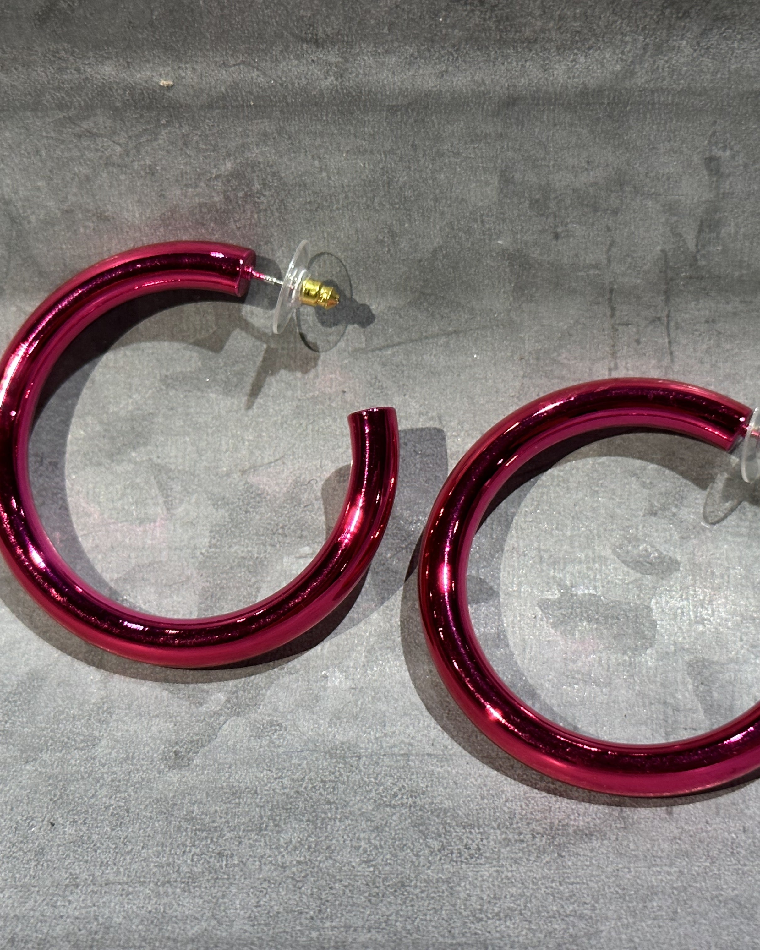 classic hoop style stud earrings in pink