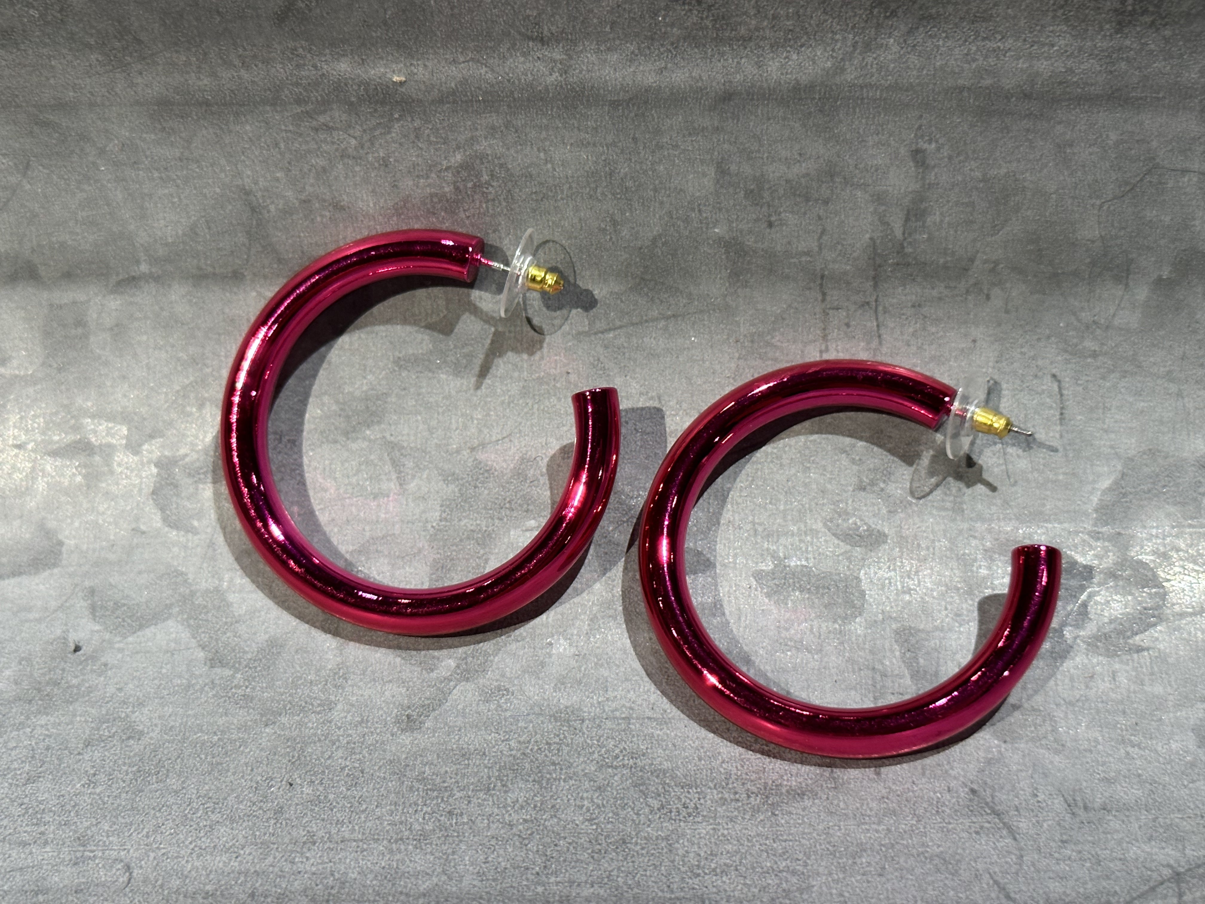 classic hoop style stud earrings in pink