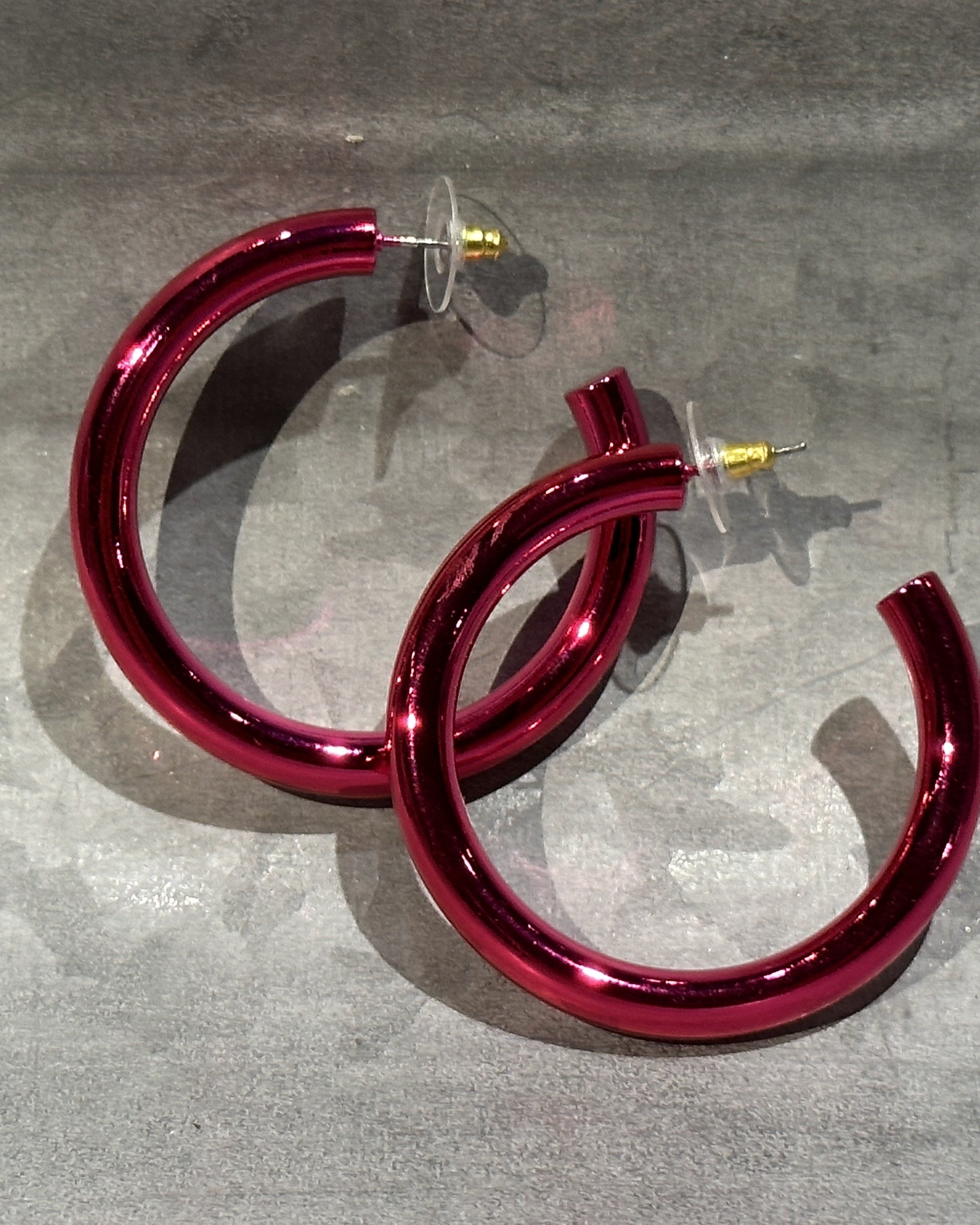 classic hoop style stud earrings in pink