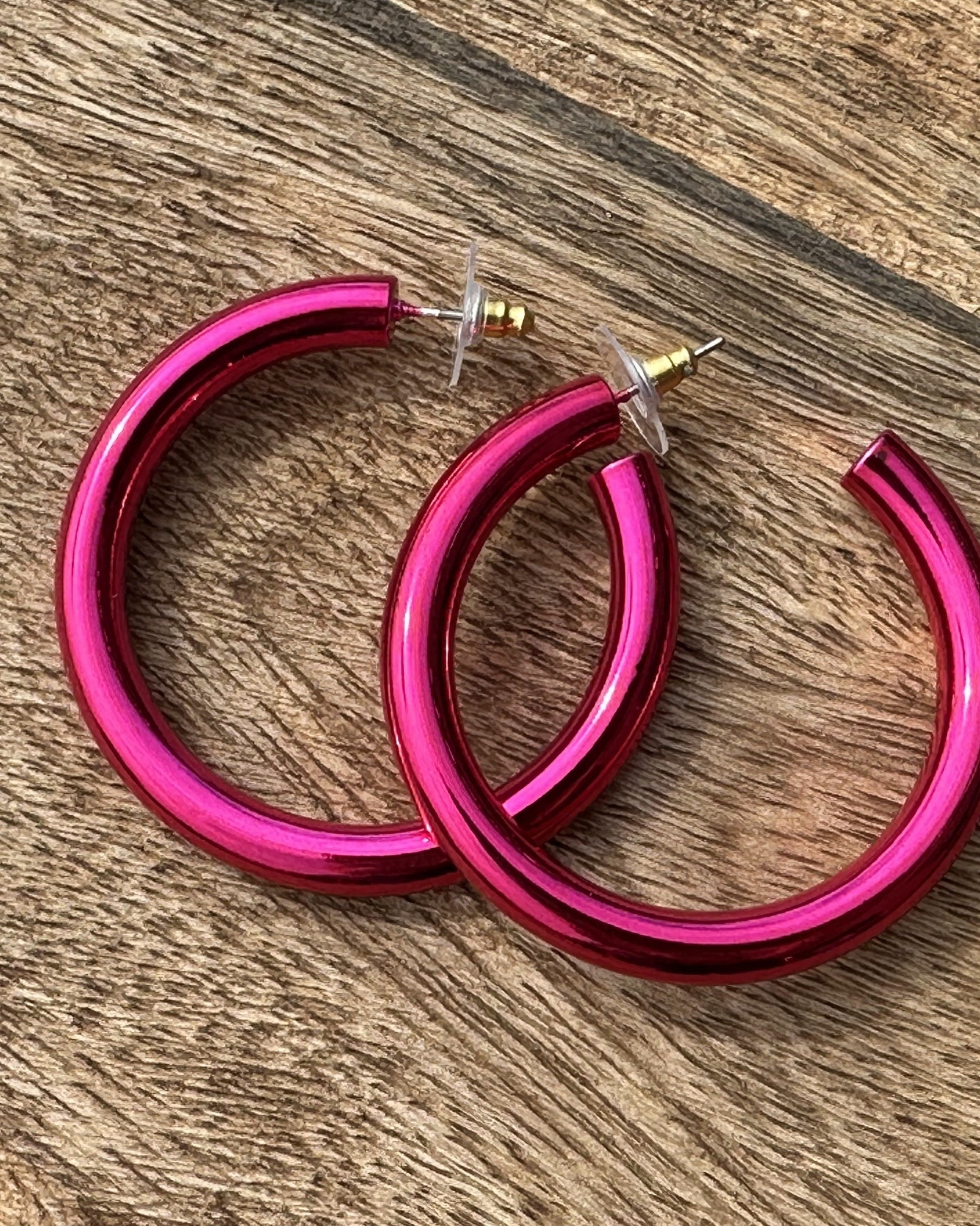 classic hoop style stud earrings in pink
