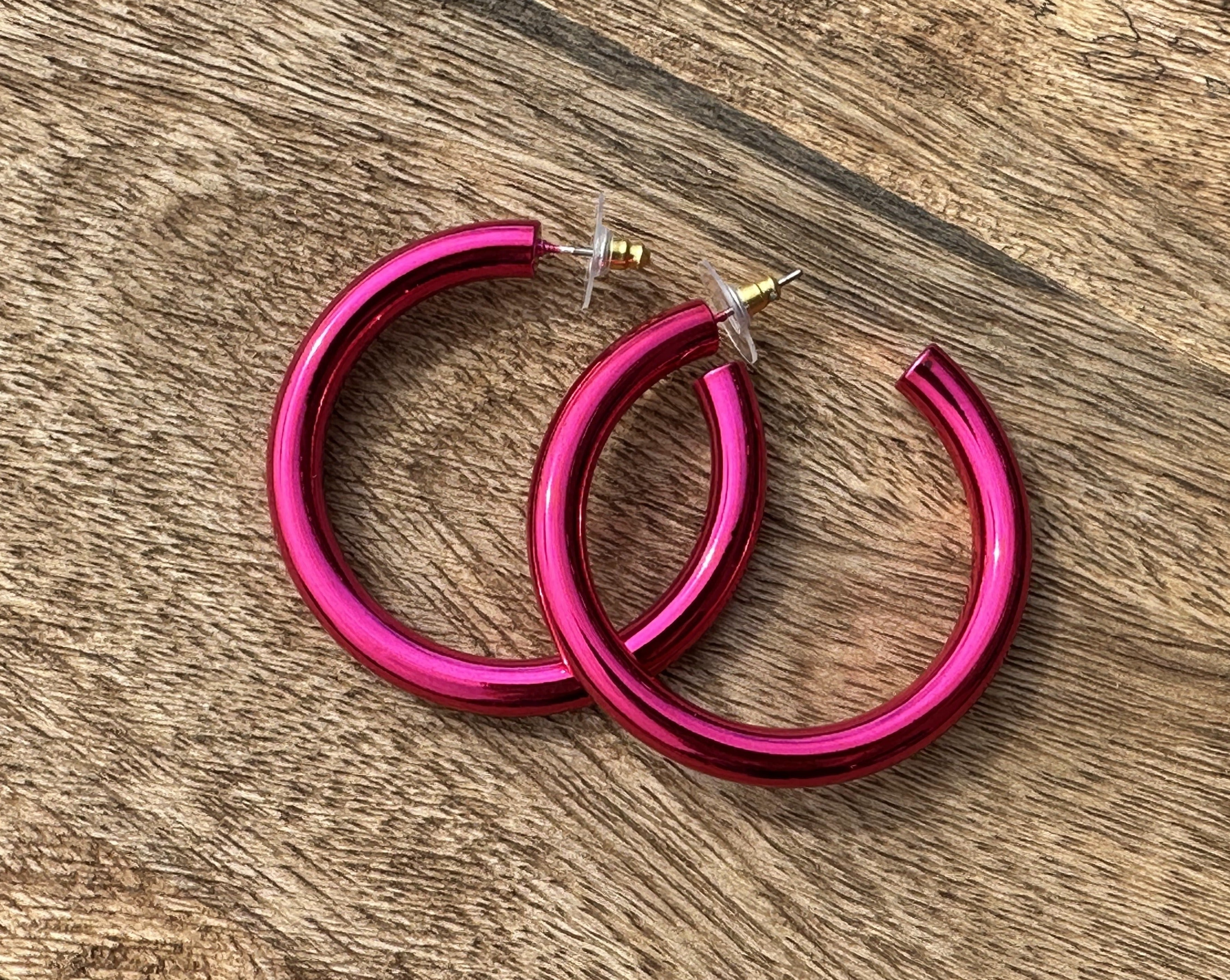 classic hoop style stud earrings in pink