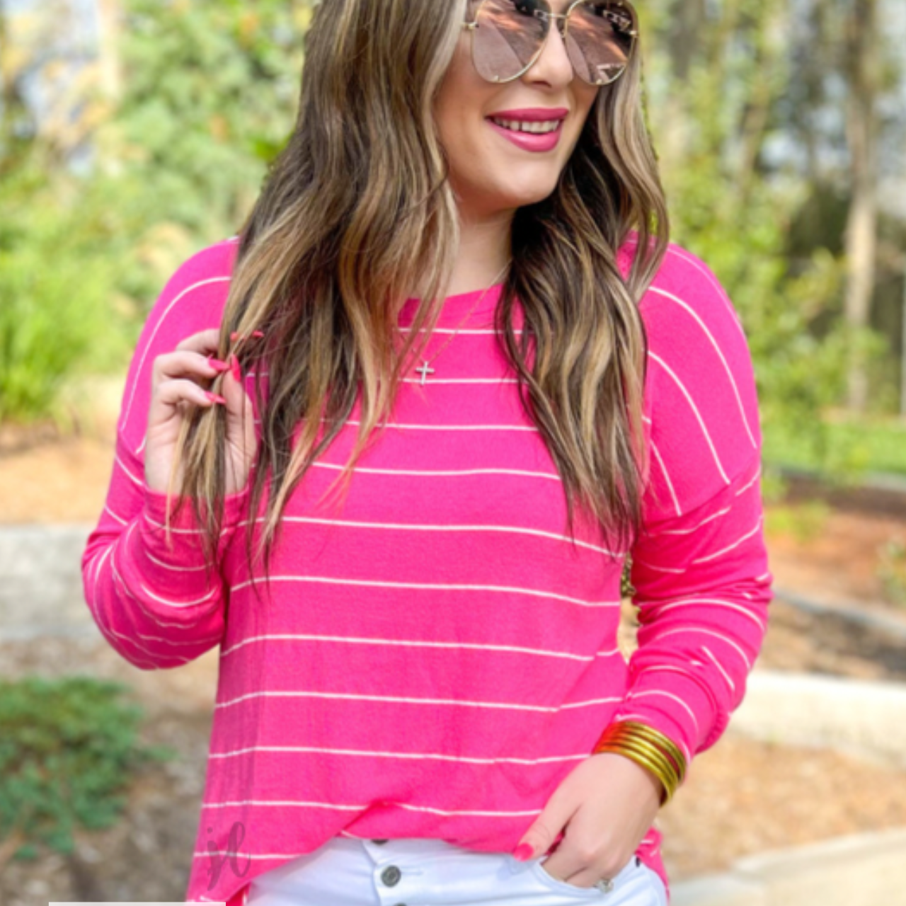 MADE IN USA lightweight horizontal striped top with long sleeves, a crew neckline, and a slouched silhouette that ends in a rounded hemline on a solid pink base
