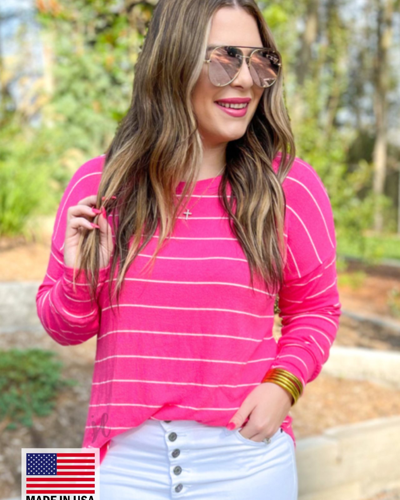MADE IN USA lightweight horizontal striped top with long sleeves, a crew neckline, and a slouched silhouette that ends in a rounded hemline on a solid pink base