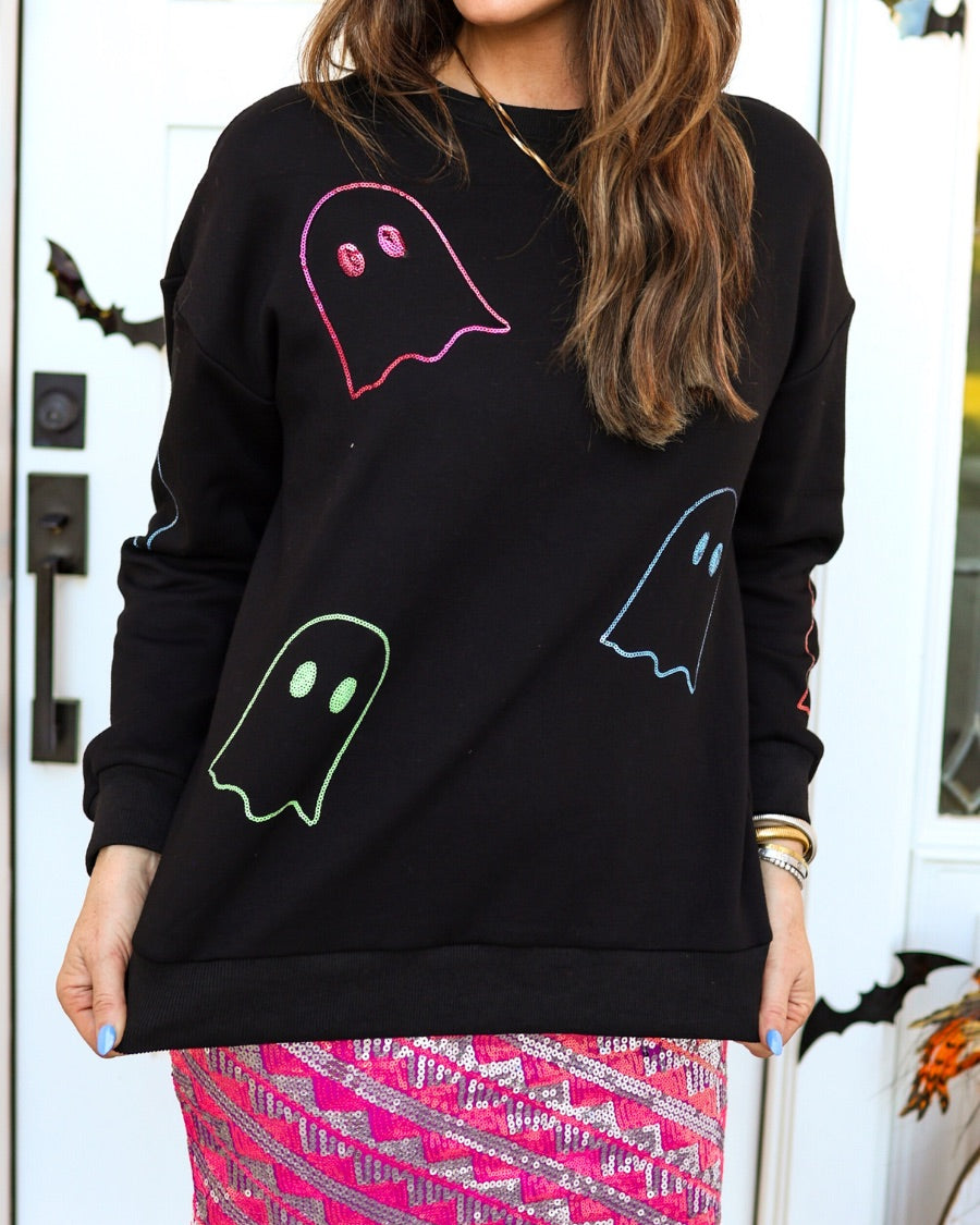 a black long-sleeve pullover crafted from soft fabric with a crew neckline, dropped shoulders, ribbed cuffs, banded hem, relaxed fit, classic sweatshirt silhouette, and colorful sequin ghost outline pattern across the front, back, and sleeve
