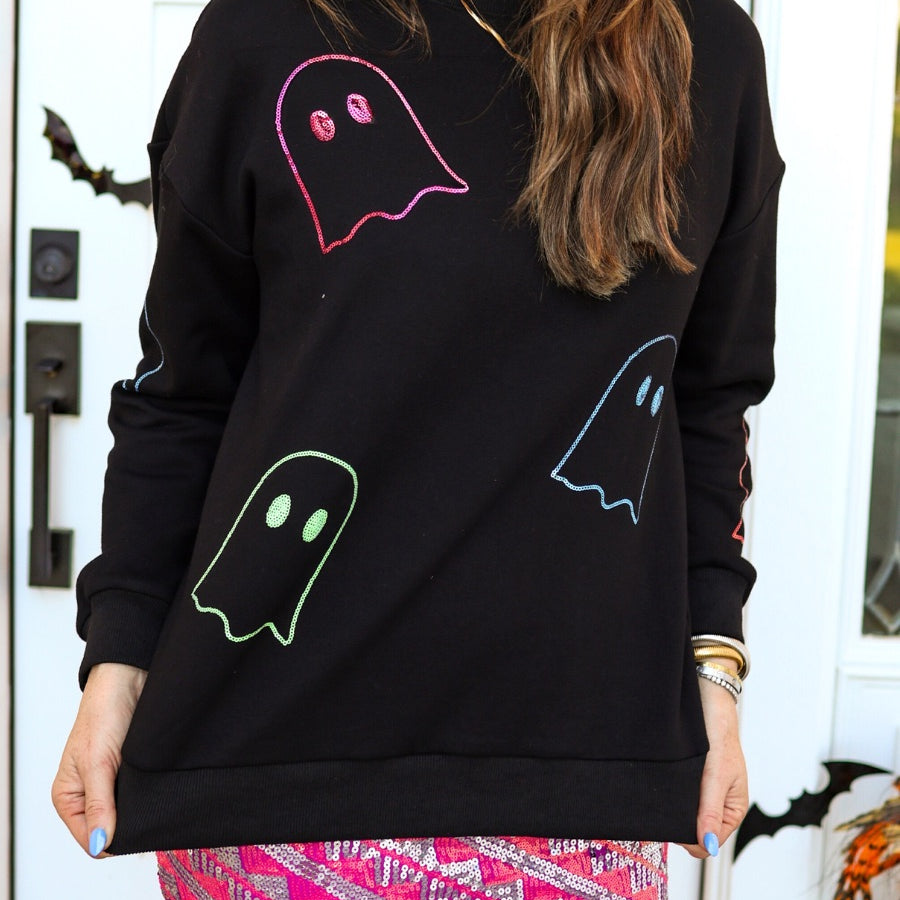 a black long-sleeve pullover crafted from soft fabric with a crew neckline, dropped shoulders, ribbed cuffs, banded hem, relaxed fit, classic sweatshirt silhouette, and colorful sequin ghost outline pattern across the front, back, and sleeve