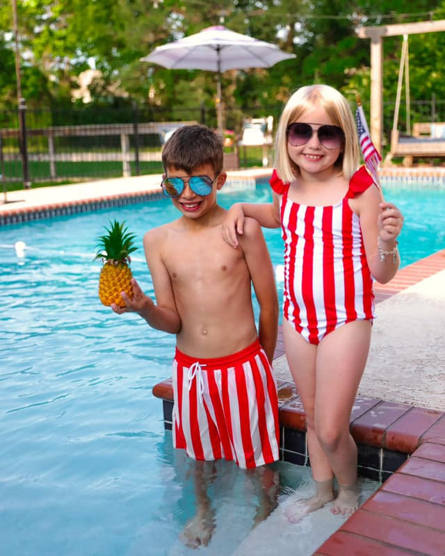 red and white striped swimsuit trunks for boys and one-piece for girls