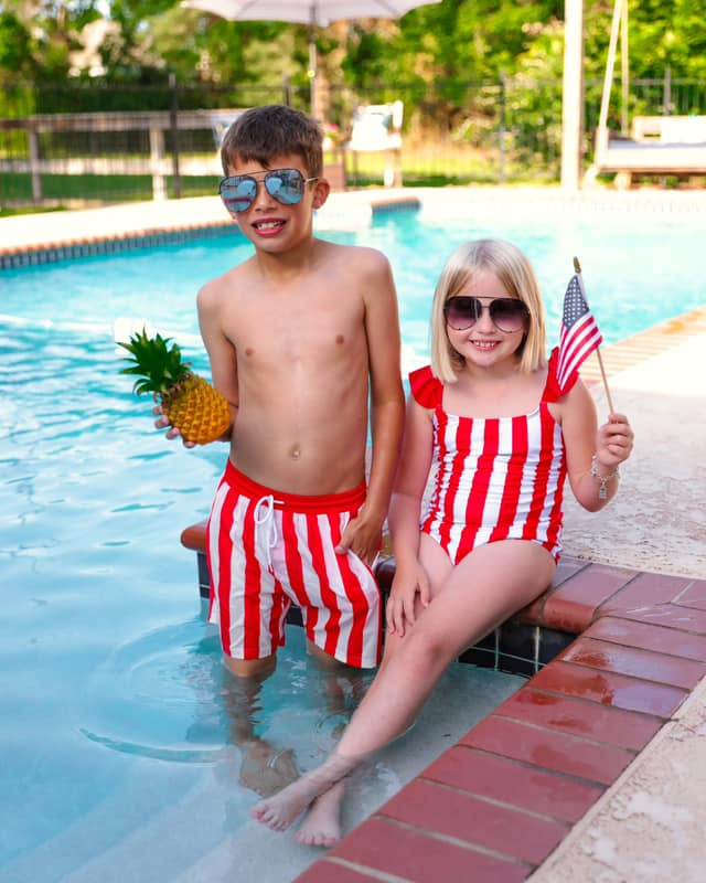 red and white striped swimsuit trunks for boys and one-piece for girls