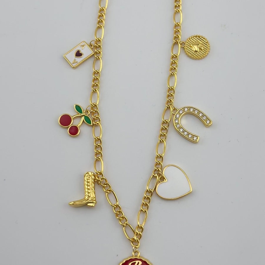 a gold-plated necklace with a stylish chain and seven charms