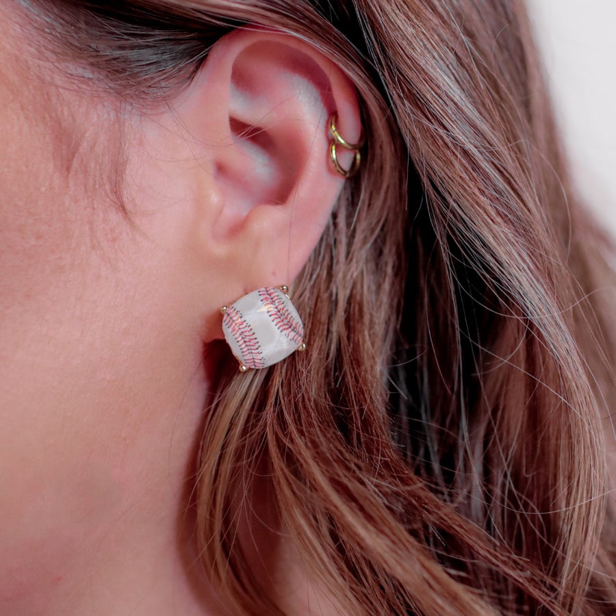 lightweight stud earrings with sporty prints with gold post-style earring backs and clear rubber stopper in white for baseball