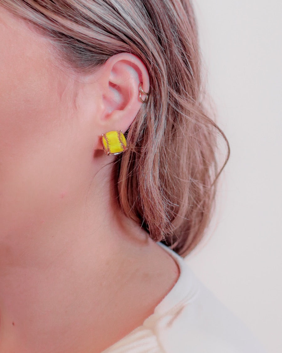 lightweight stud earrings with sporty prints with gold post-style earring backs and clear rubber stopper in yellow for softball