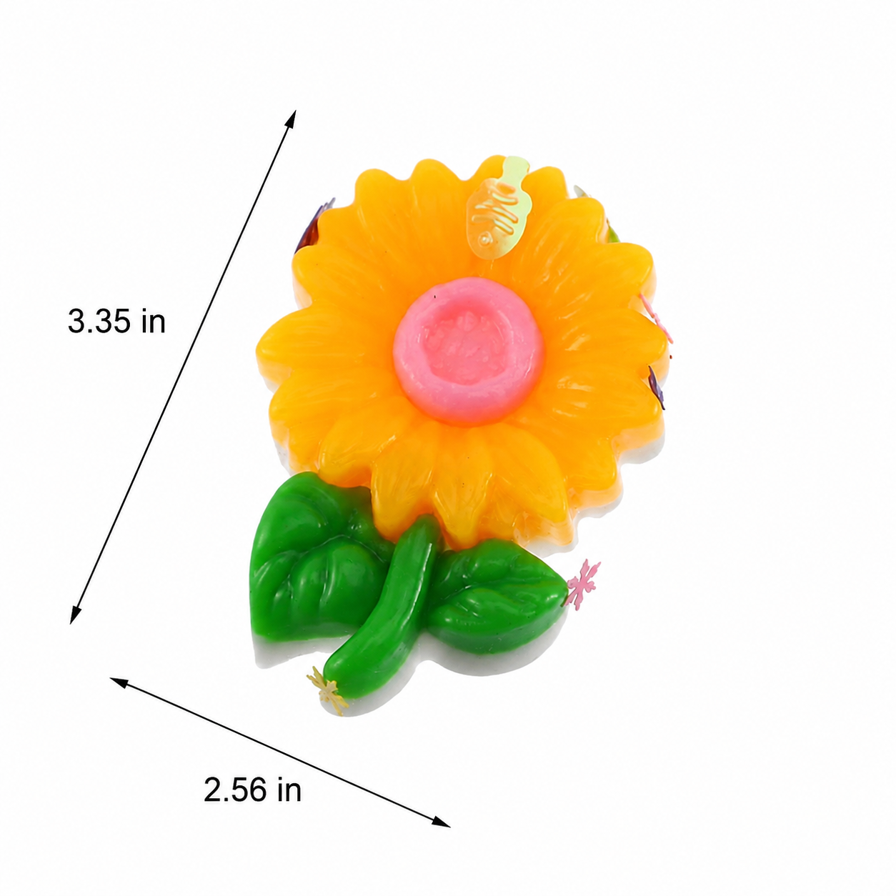 a yellow flower-shaped decompression squishy toy with glossy petals, green leaves, mini decorative accents, pastel pom poms, and size measurements