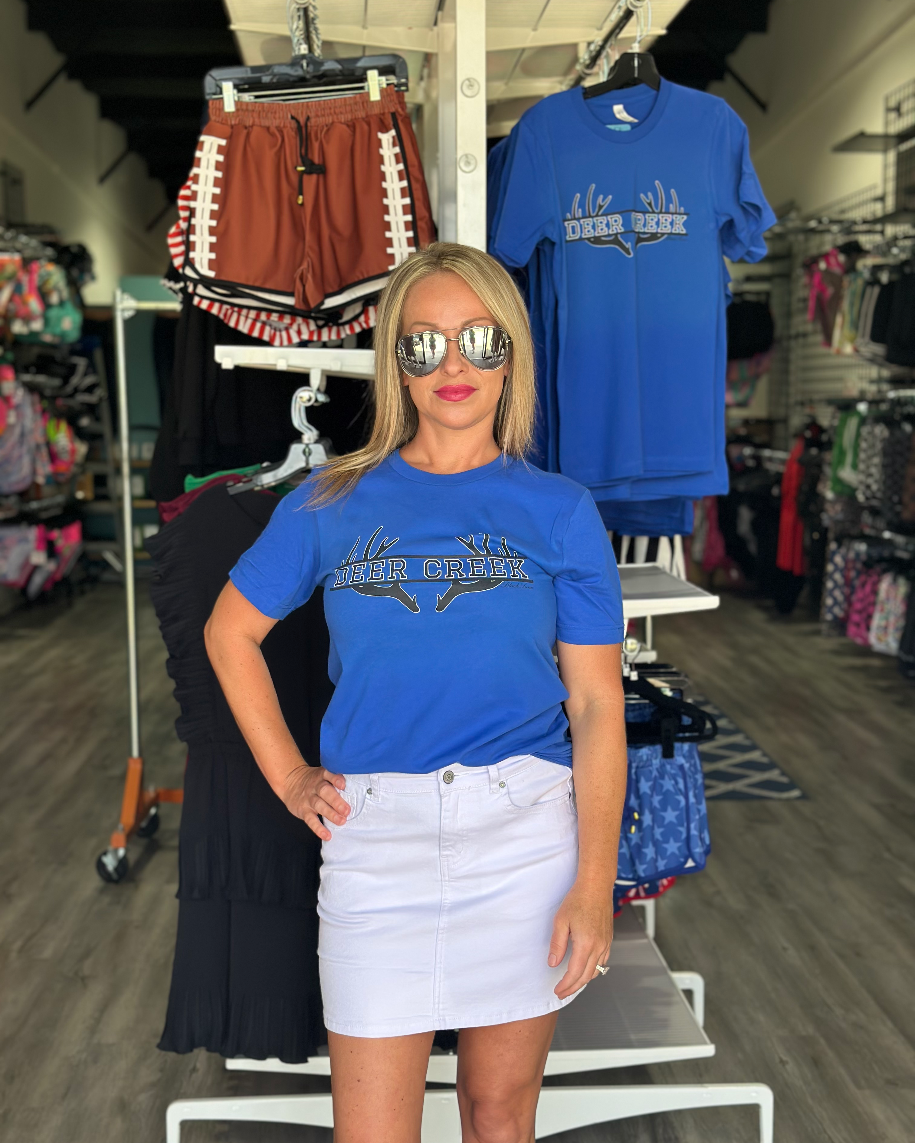 Bella+Canvas unisex tee with crisp screen-printed antlers framing 'DEER CREEK' and discreetly tagged 'BLACK SWAN' below for a signature look