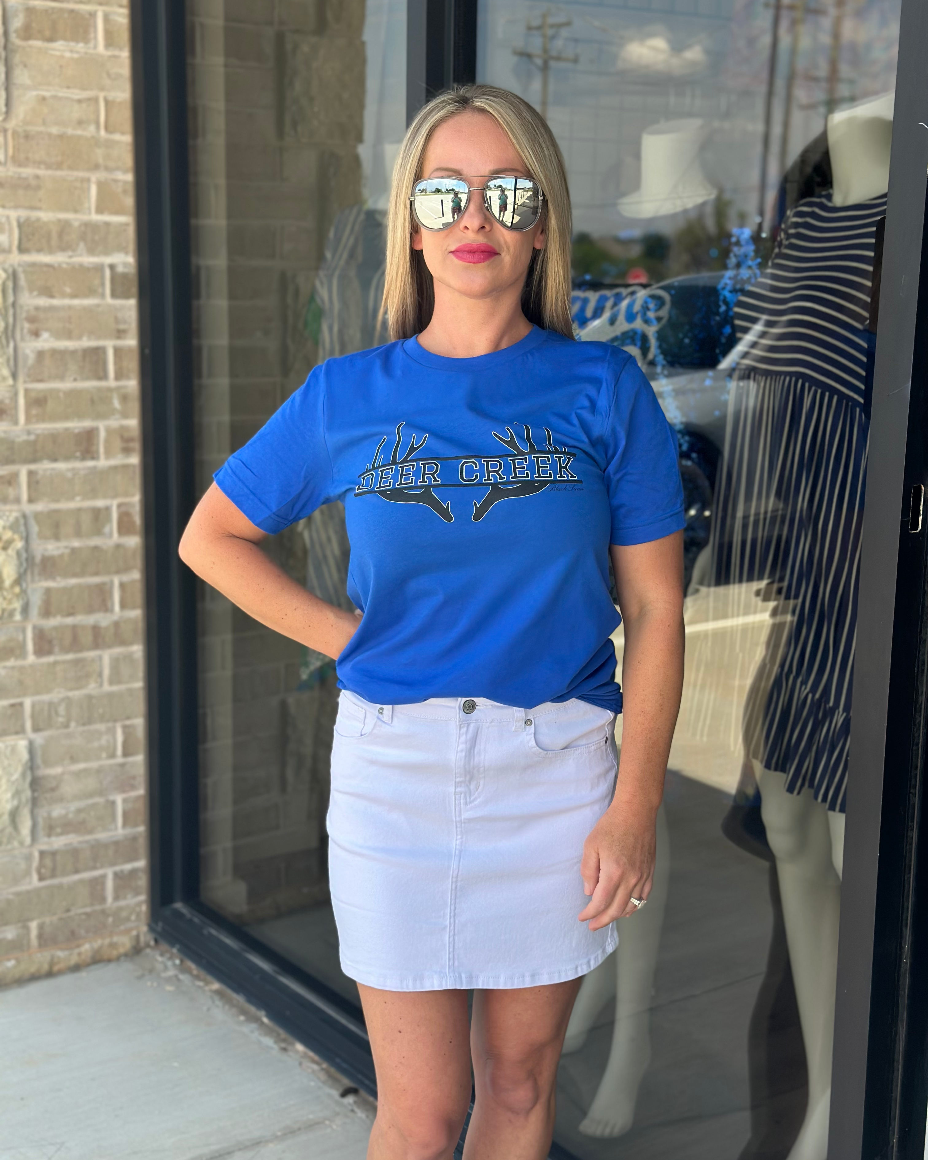 Bella+Canvas unisex tee with crisp screen-printed antlers framing 'DEER CREEK' and discreetly tagged 'BLACK SWAN' below for a signature look