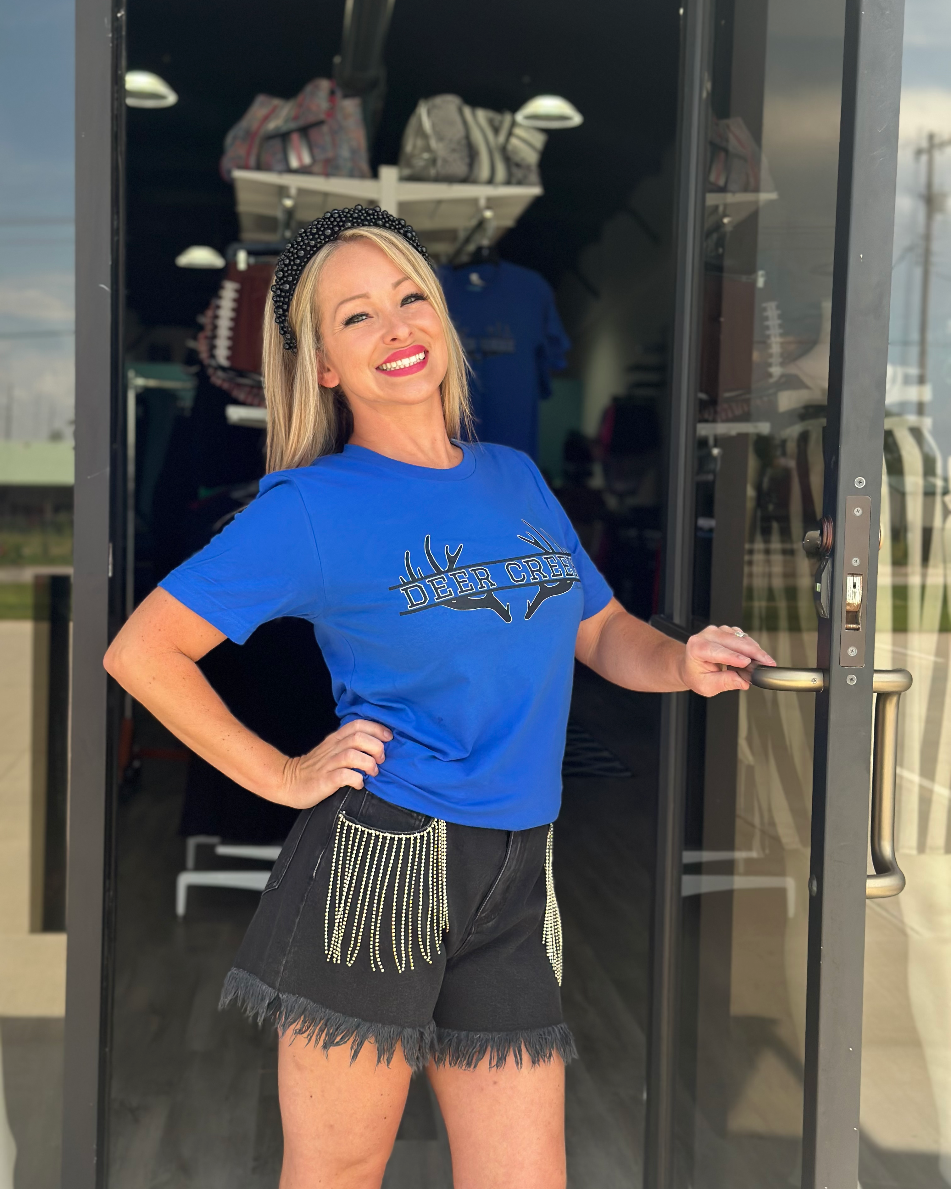 Bella+Canvas unisex tee with crisp screen-printed antlers framing 'DEER CREEK' and discreetly tagged 'BLACK SWAN' below for a signature look