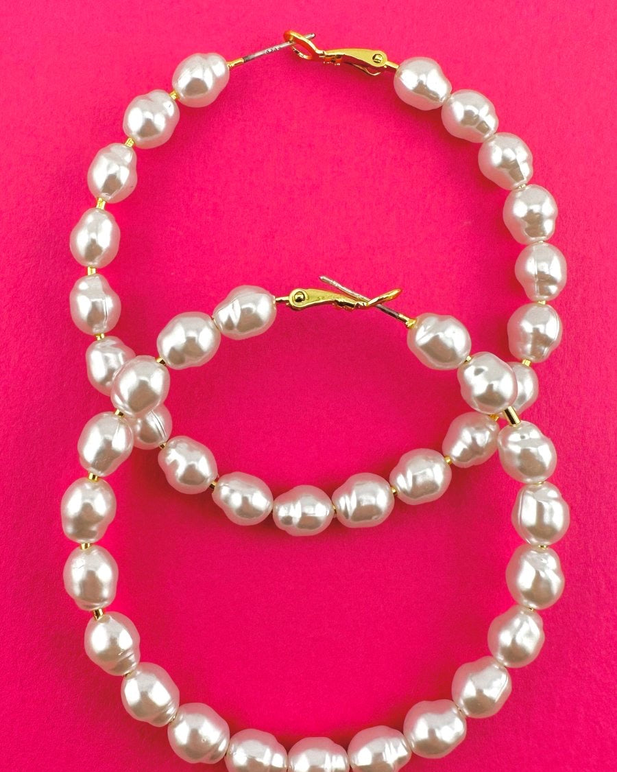 post-stud pearl hoops with a comfort earring back in gold