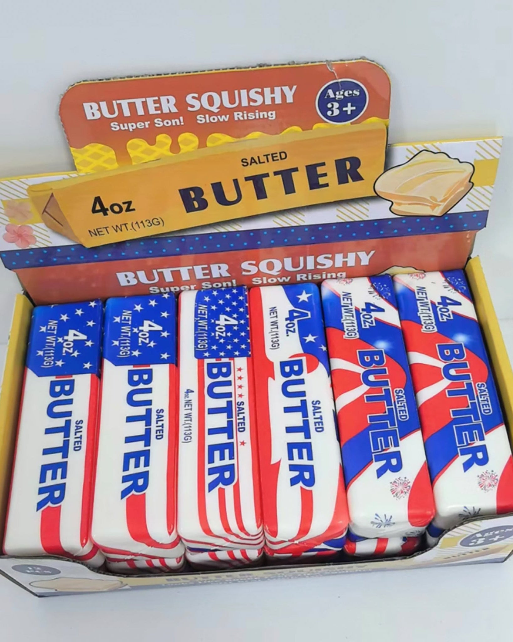 Box of Butter Squishy toy with American flag design on a white background