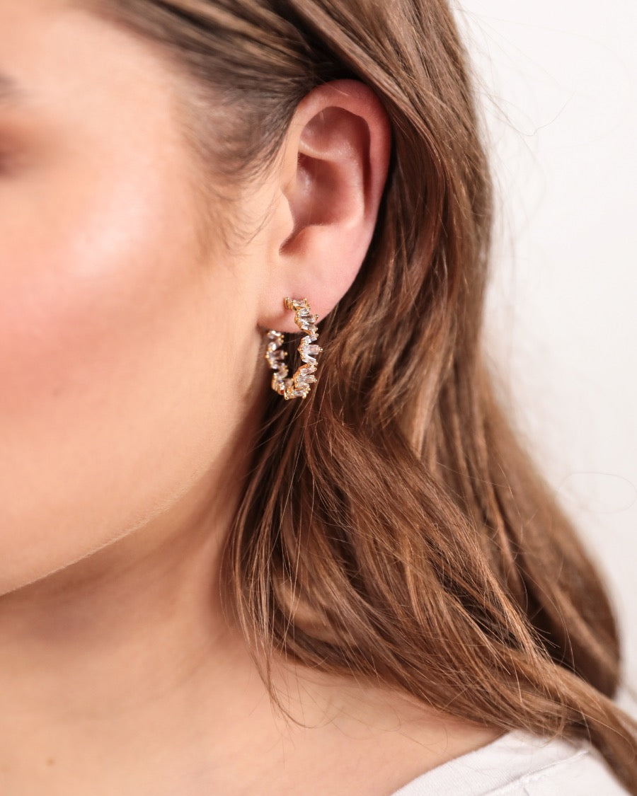 gold-plated rhinestone hoop stud earring with a comfort back earring and plastic disc stopper in gold
