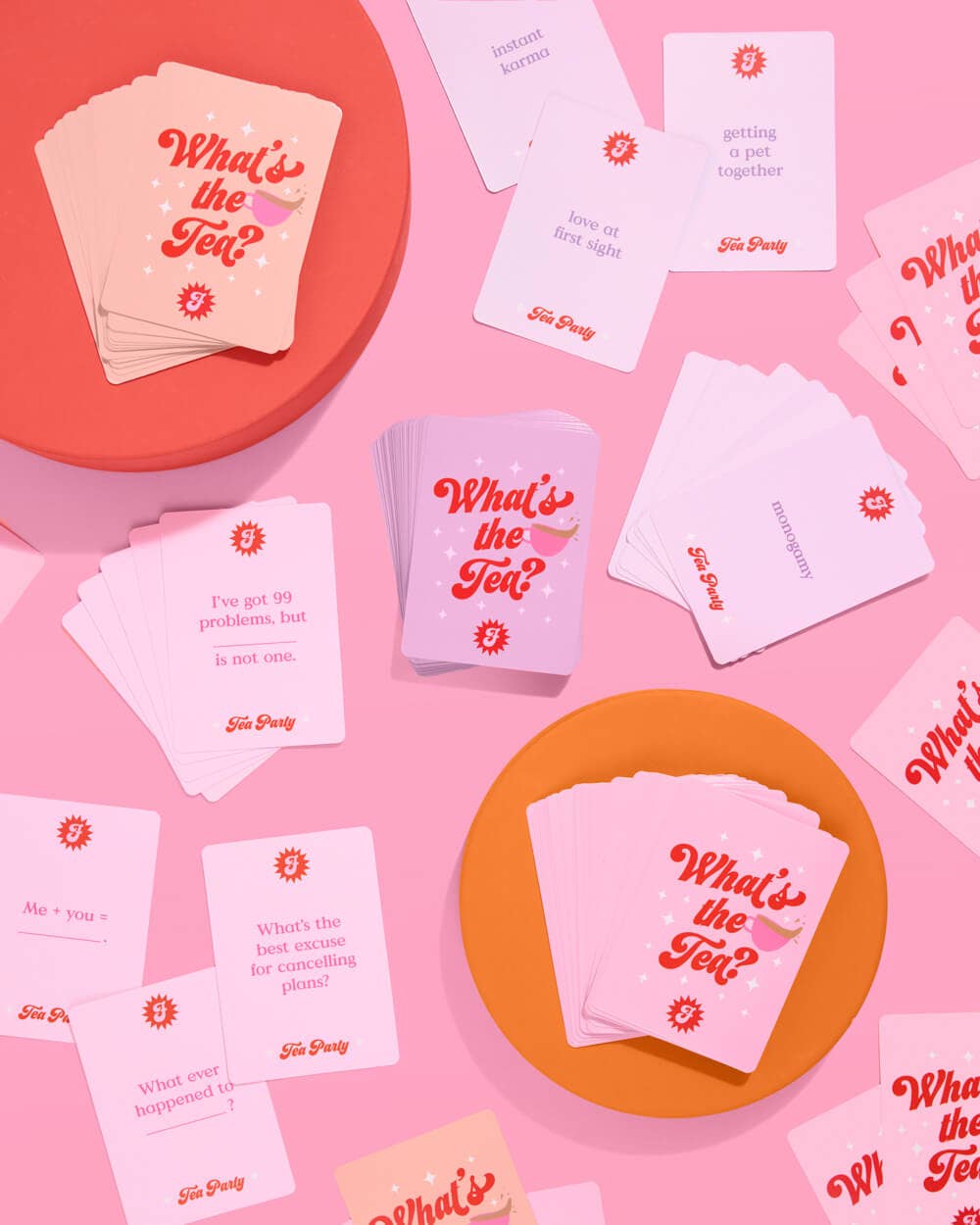 Cards with 'What's the Tea?' text on a pink background