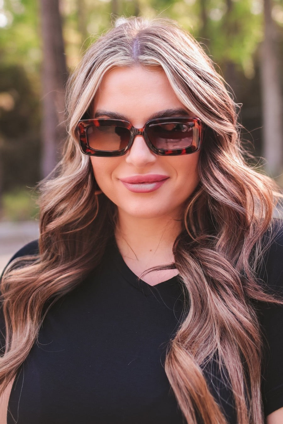 brown chunky rectangular sunglasses with thick frames, tinted lenses, smooth finish, UV protection, and brand detail (on both the temple and the complimentary black pouch)