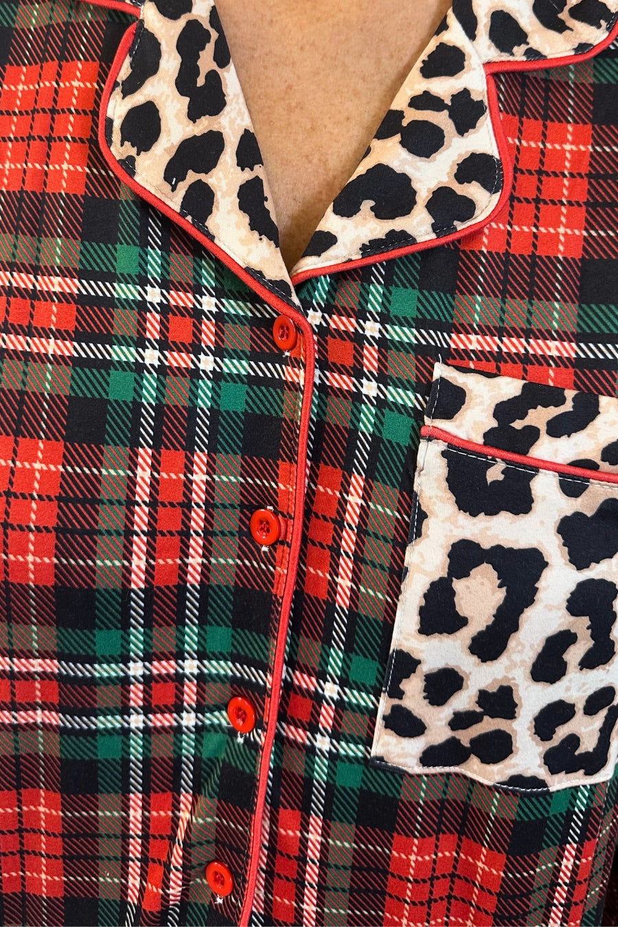 long sleeve top and matching shorts on a plaid base with a mix of leopard print and red accents