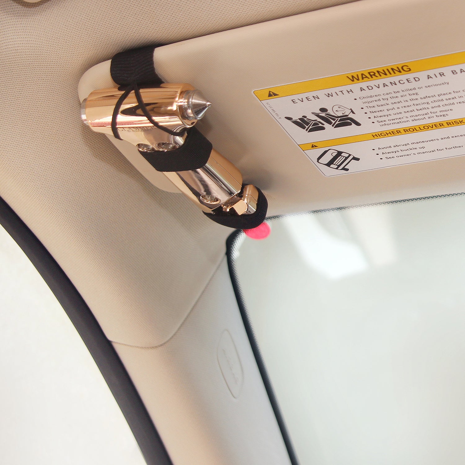 2-in-1 metallic escape hammer for the car with a velcro visor strap available in mint, pink, purple, rose gold, silver, and white